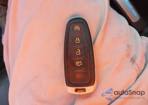 2016 Ford Escape Titanium z USA, uszkodzony, nr VIN 1FMCU0JX4GUB48809